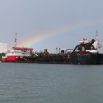 Phase II - TSHD R.N. WEEKS at the Beachfill Pumpoff Station Barge with Rainbow after Storm